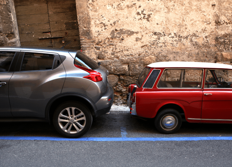 old car and new car side by side